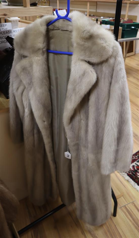 A light grey blonde mink full length coat